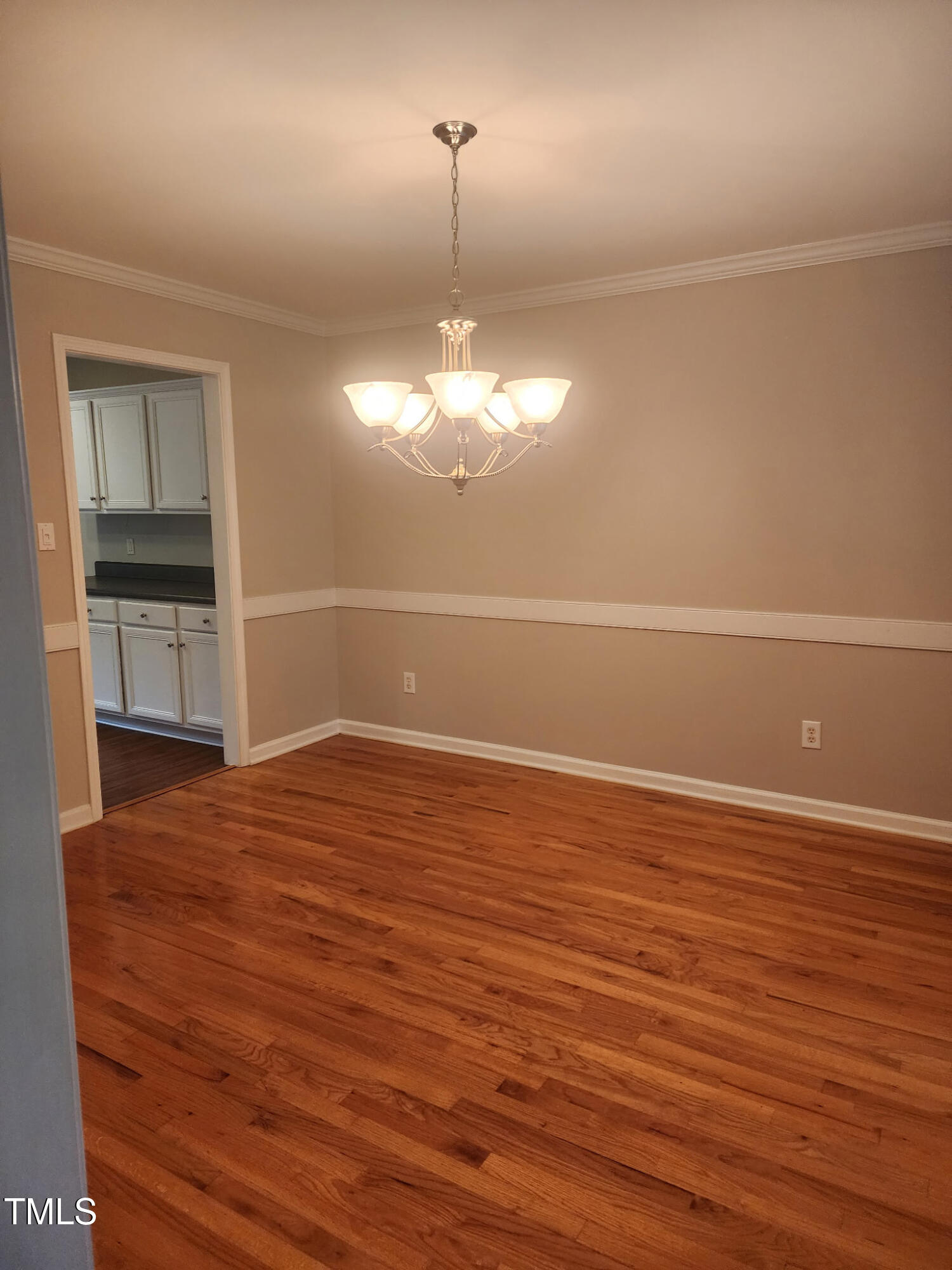 133 Rustic Lane Smithfield, NC 27577 - Photo 9 of 24 a view of a room with wooden floor and electronic appliances