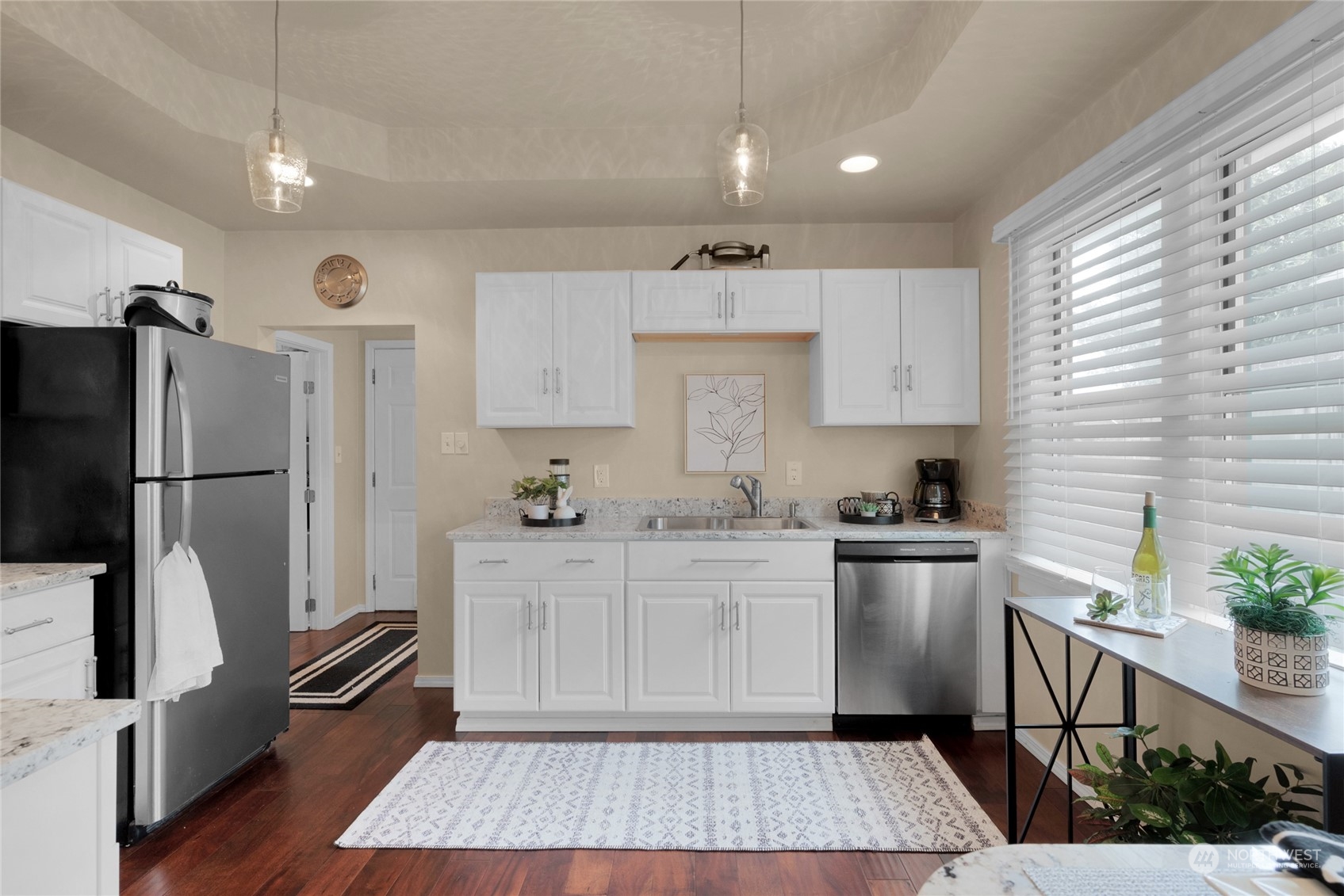 2708 18th Street Everett, WA 98201 - Photo 11 of 29 a kitchen with stainless steel appliances granite countertop a refrigerator and a stove