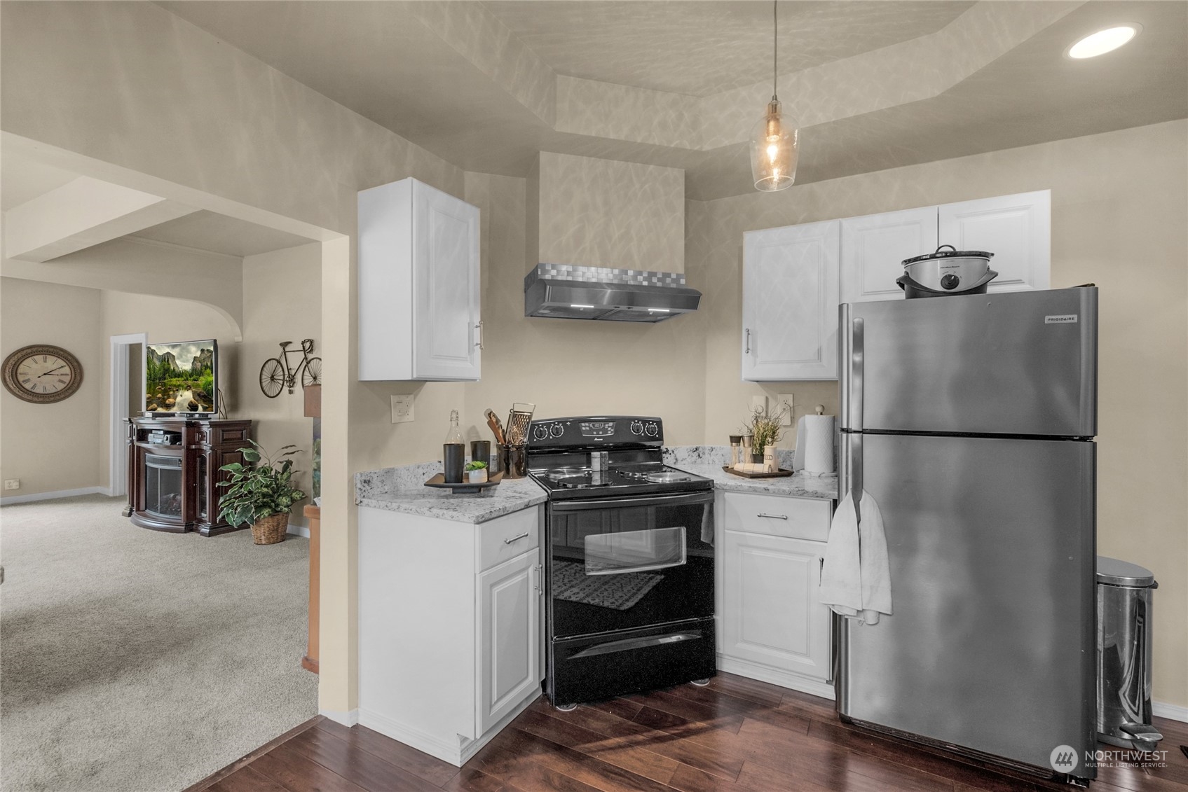 2708 18th Street Everett, WA 98201 - Photo 12 of 29 a kitchen with stainless steel appliances granite countertop a refrigerator a stove a sink and a refrigerator