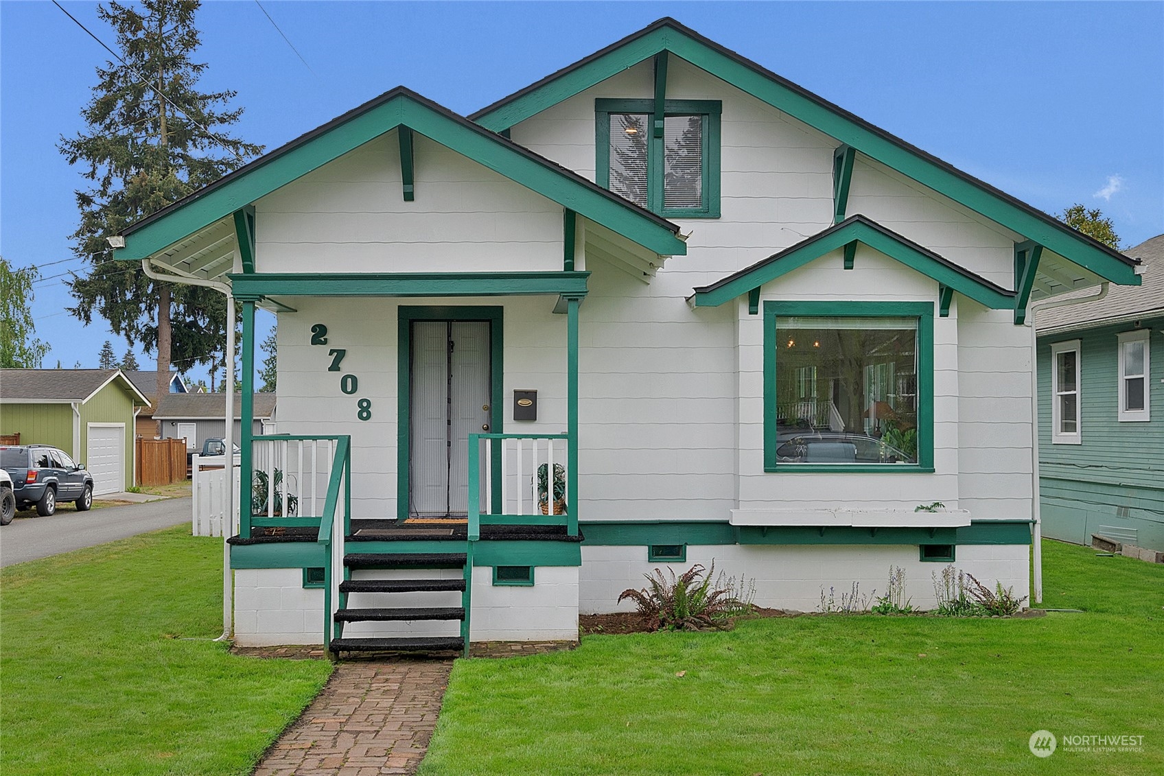 2708 18th Street Everett, WA 98201 - Photo 2 of 29 a front view of a house with a yard