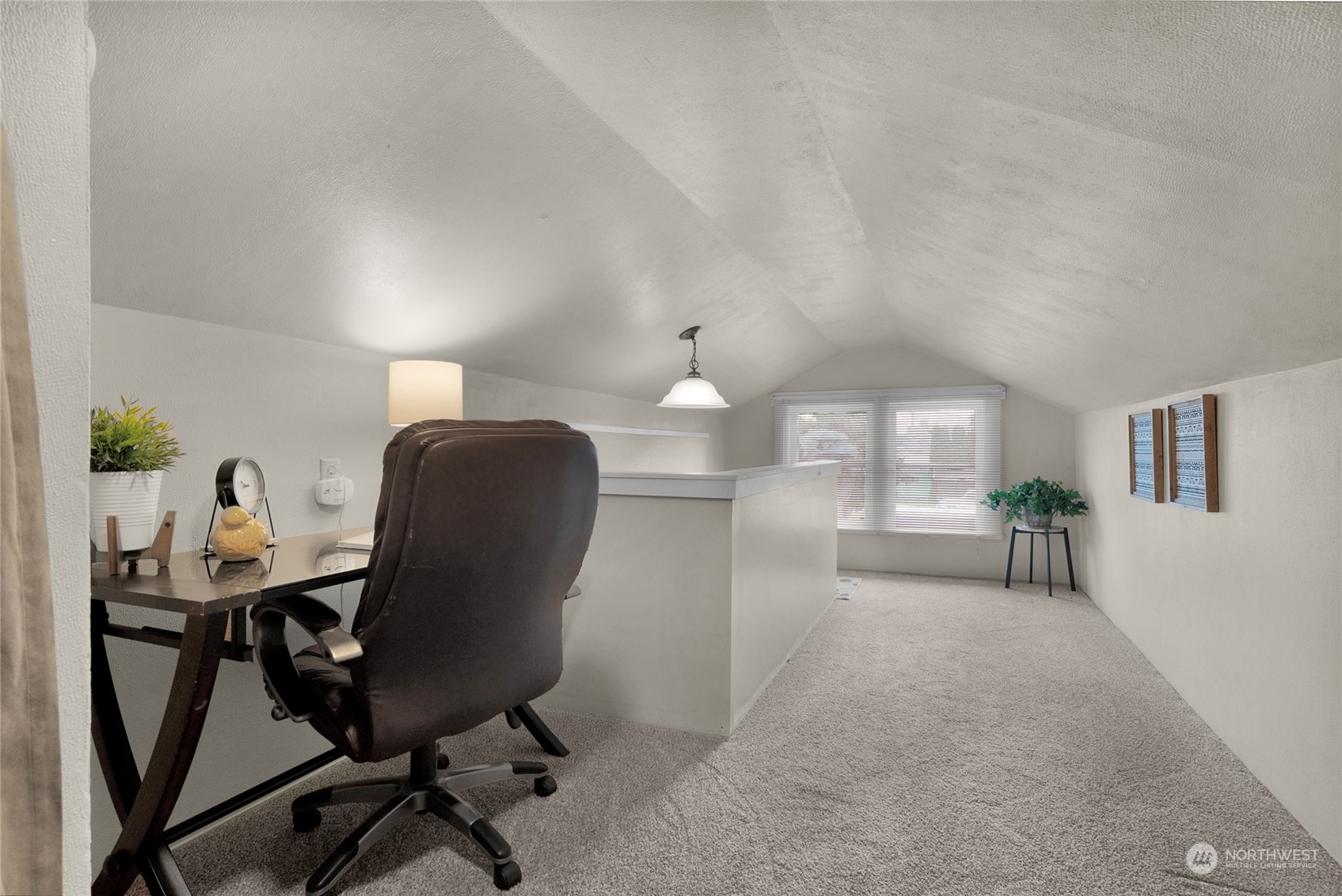 2708 18th Street Everett, WA 98201 - Photo 21 of 29 a view of a workspace with furniture and a window