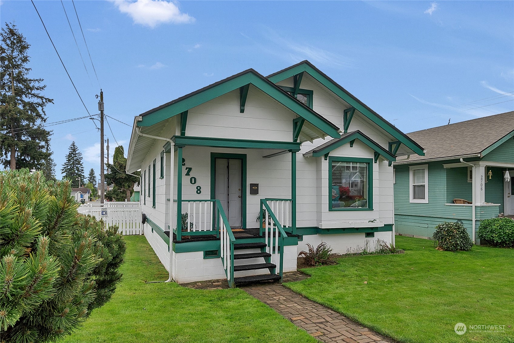 2708 18th Street Everett, WA 98201 - Photo 3 of 29 a front view of a house with a yard