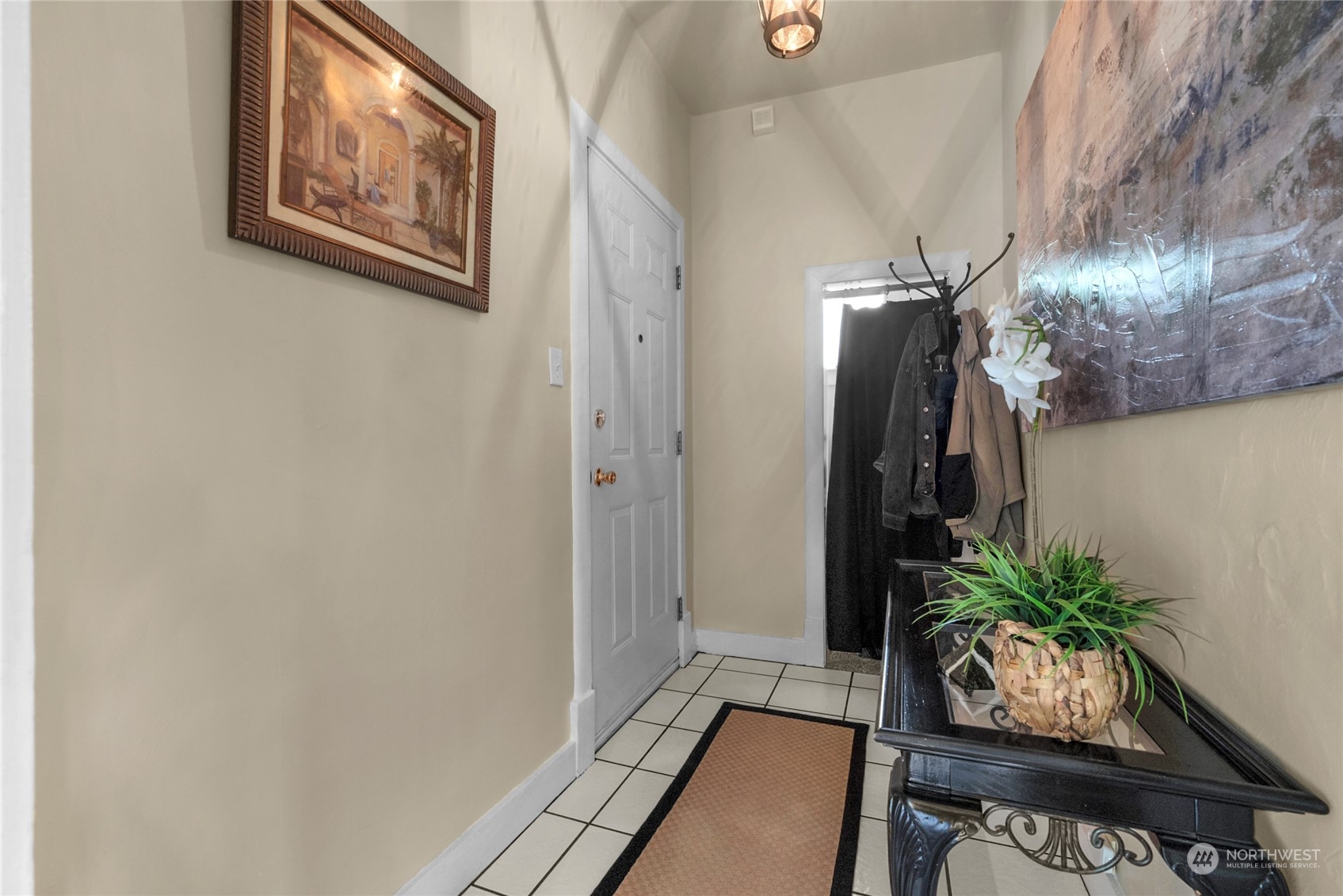 2708 18th Street Everett, WA 98201 - Photo 5 of 29 a room with furniture and potted plant