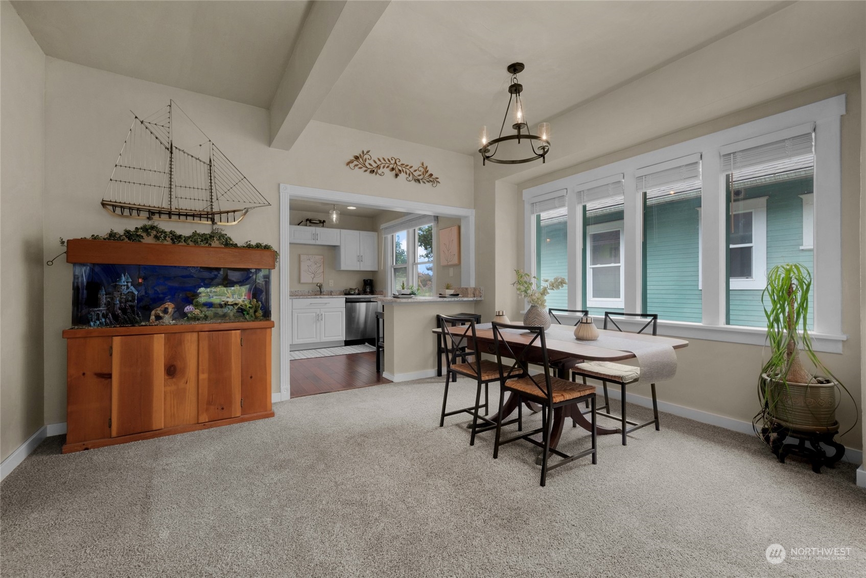 2708 18th Street Everett, WA 98201 - Photo 9 of 29 a view of a dining room with furniture window and wooden floor