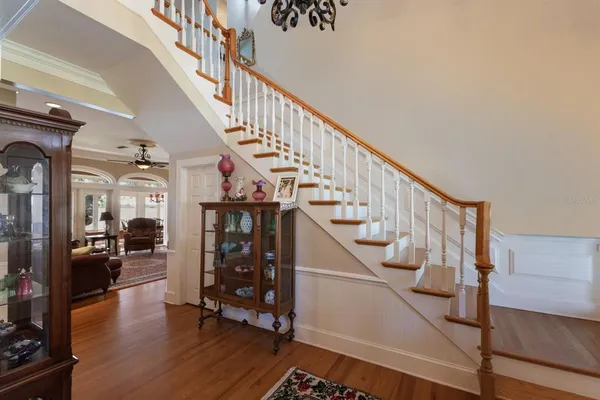 a large kitchen with kitchen island a sink appliances and a counter top space