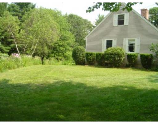 920 Piper Road Ashby, MA 01431 - Photo 2 of 17 a front view of house with yard and green space