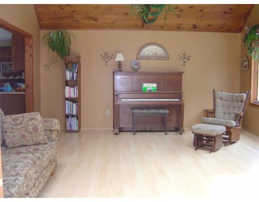 920 Piper Road Ashby, MA 01431 - Photo 10 of 17 a living room with furniture and a fireplace