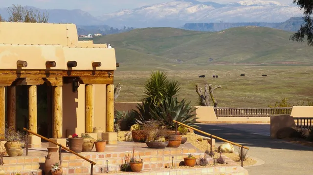 a kitchen with stainless steel appliances granite countertop a stove and a sink