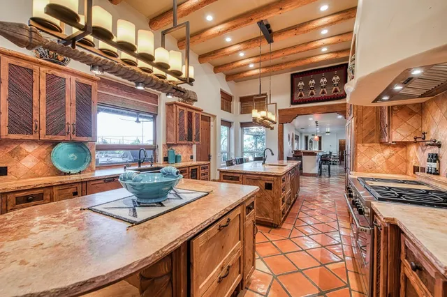 a large bathroom with a tub a sink and mirror