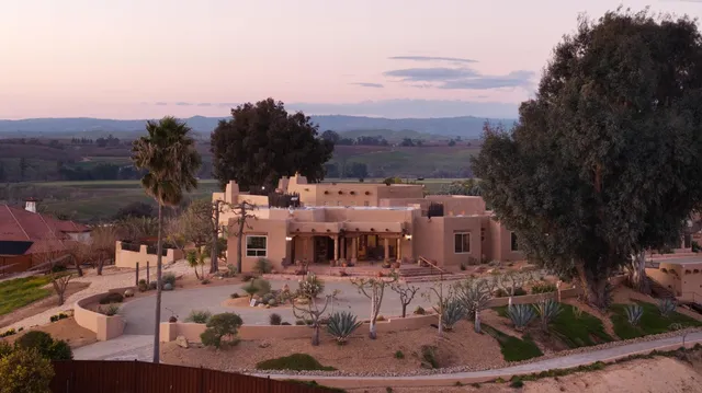 a vase of flowers sitting on a table