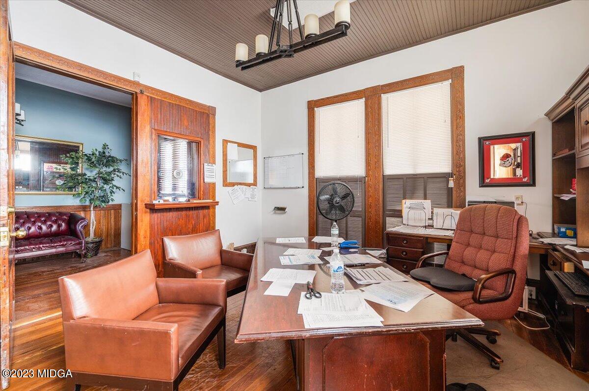 461 Pursley Street Macon, GA 31201 - Photo 13 of 25 a living room with furniture a table and chairs next to a window