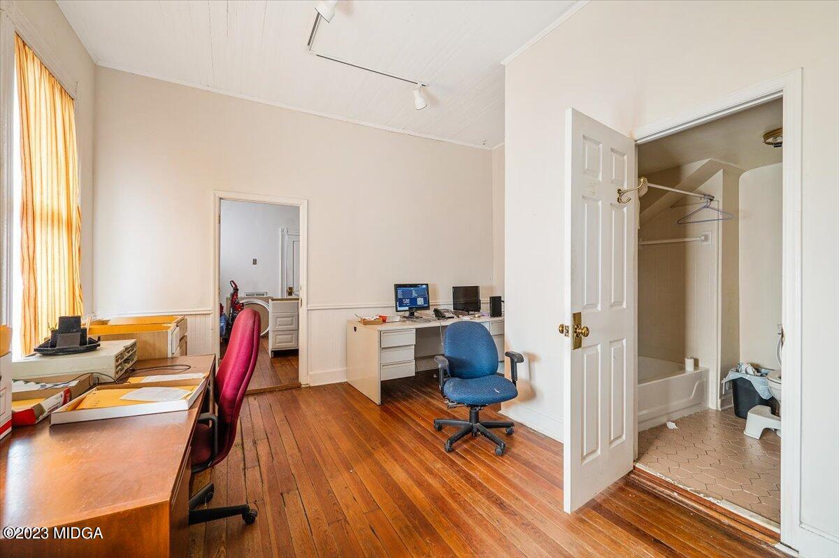 461 Pursley Street Macon, GA 31201 - Photo 14 of 25 a view of a workspace with furniture and a window