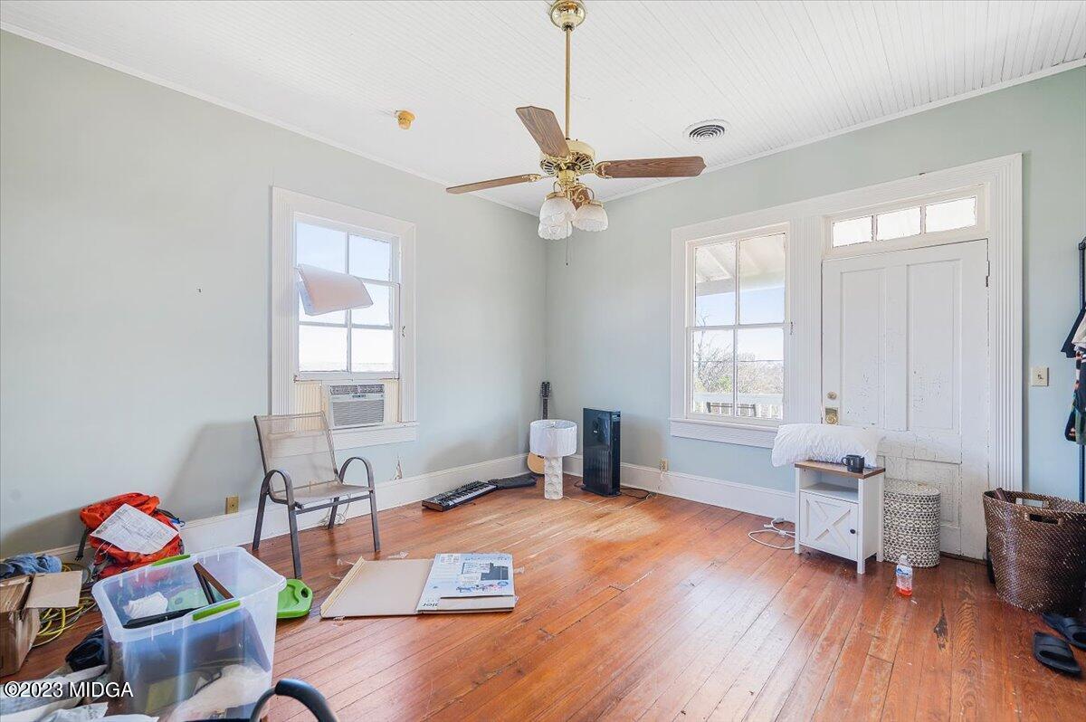 461 Pursley Street Macon, GA 31201 - Photo 19 of 25 a living room with furniture a rug and a window