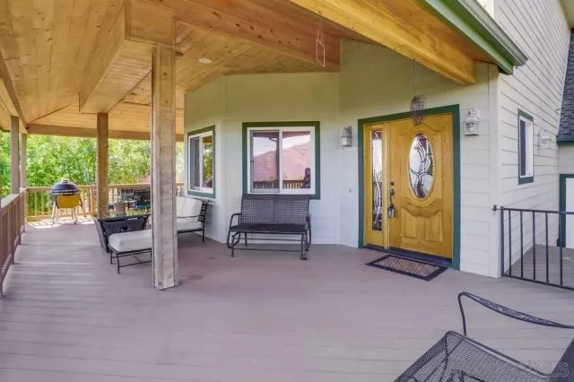 a view of an chairs and tables in the patio