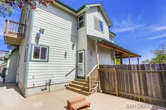 a view of a house with a street