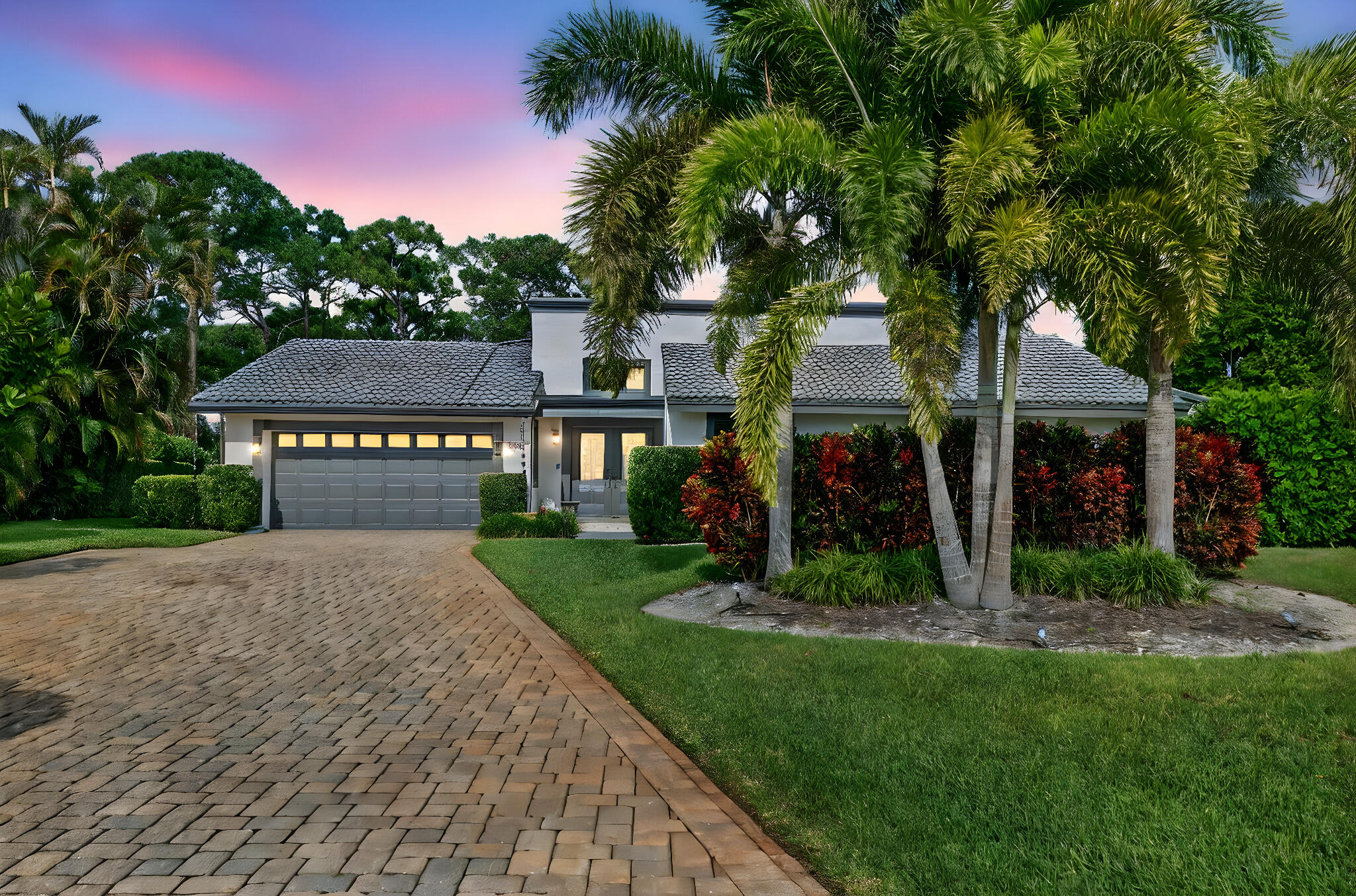 5212 Foxpointe Circle Delray Beach, FL 33445 - Photo 2 of 89 a view of a house with a yard and a large tree