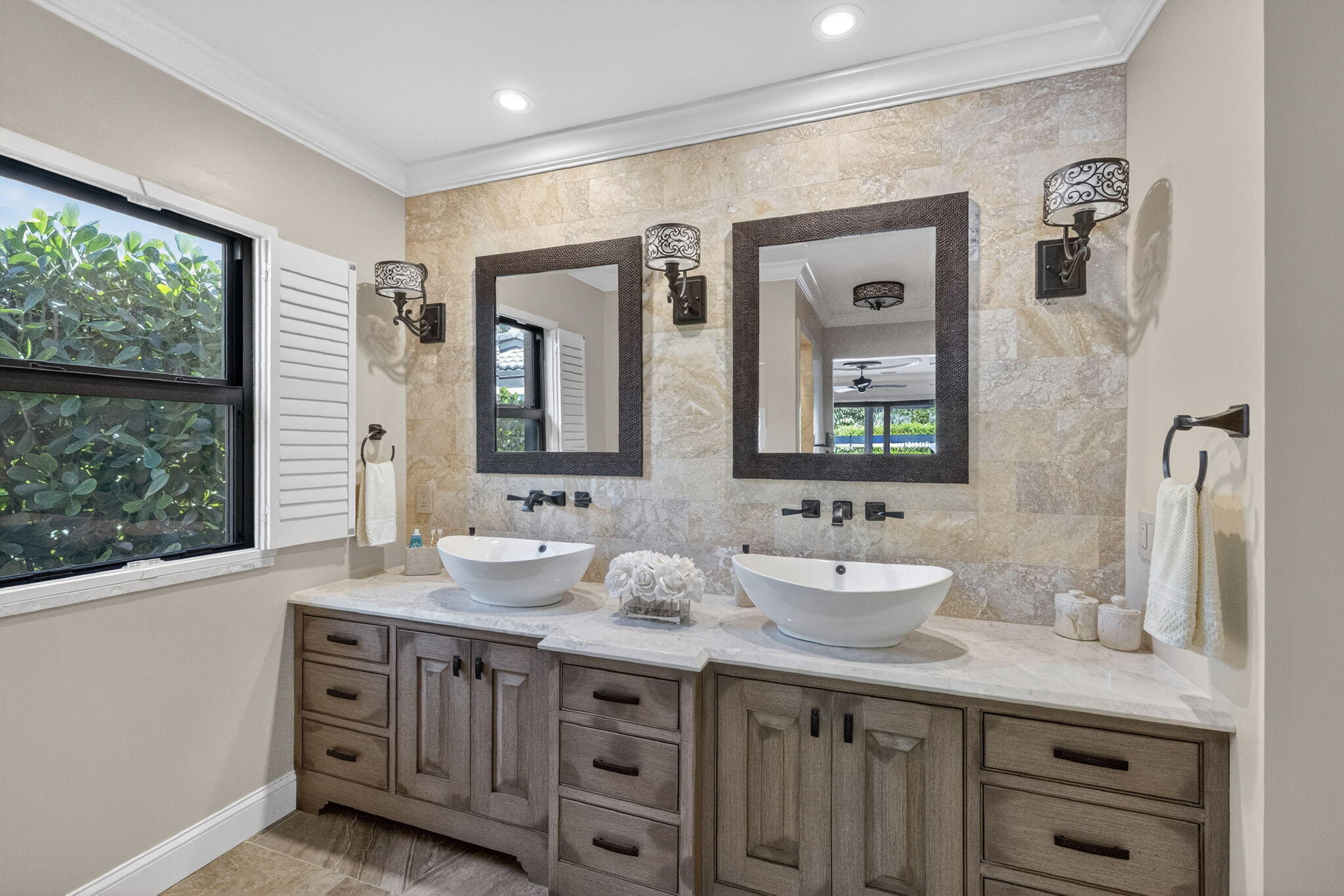 5212 Foxpointe Circle Delray Beach, FL 33445 - Photo 25 of 89 a bathroom with double sink and a mirror