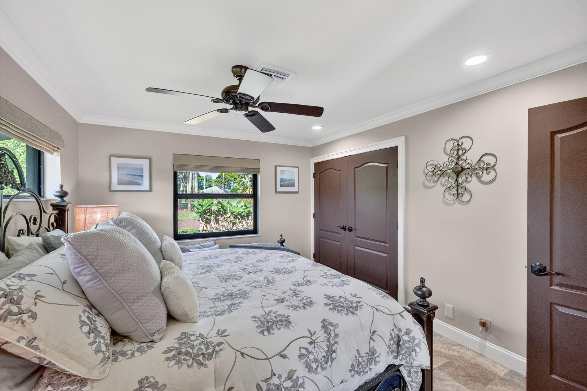 5212 Foxpointe Circle Delray Beach, FL 33445 - Photo 34 of 89 a bedroom with a bed and a window