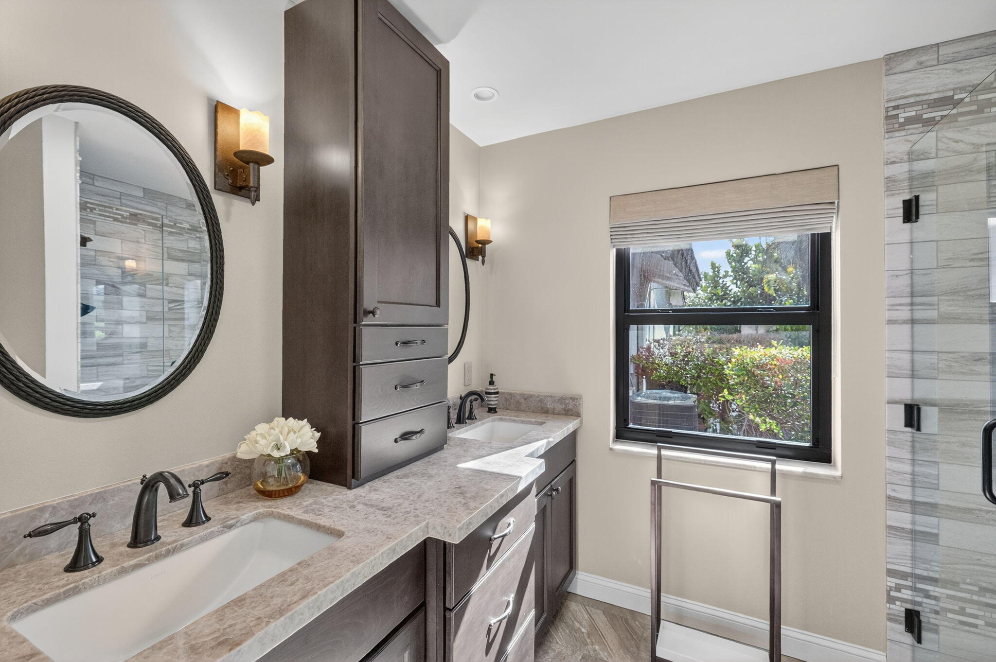 5212 Foxpointe Circle Delray Beach, FL 33445 - Photo 35 of 89 a bathroom with a granite countertop sink and a mirror
