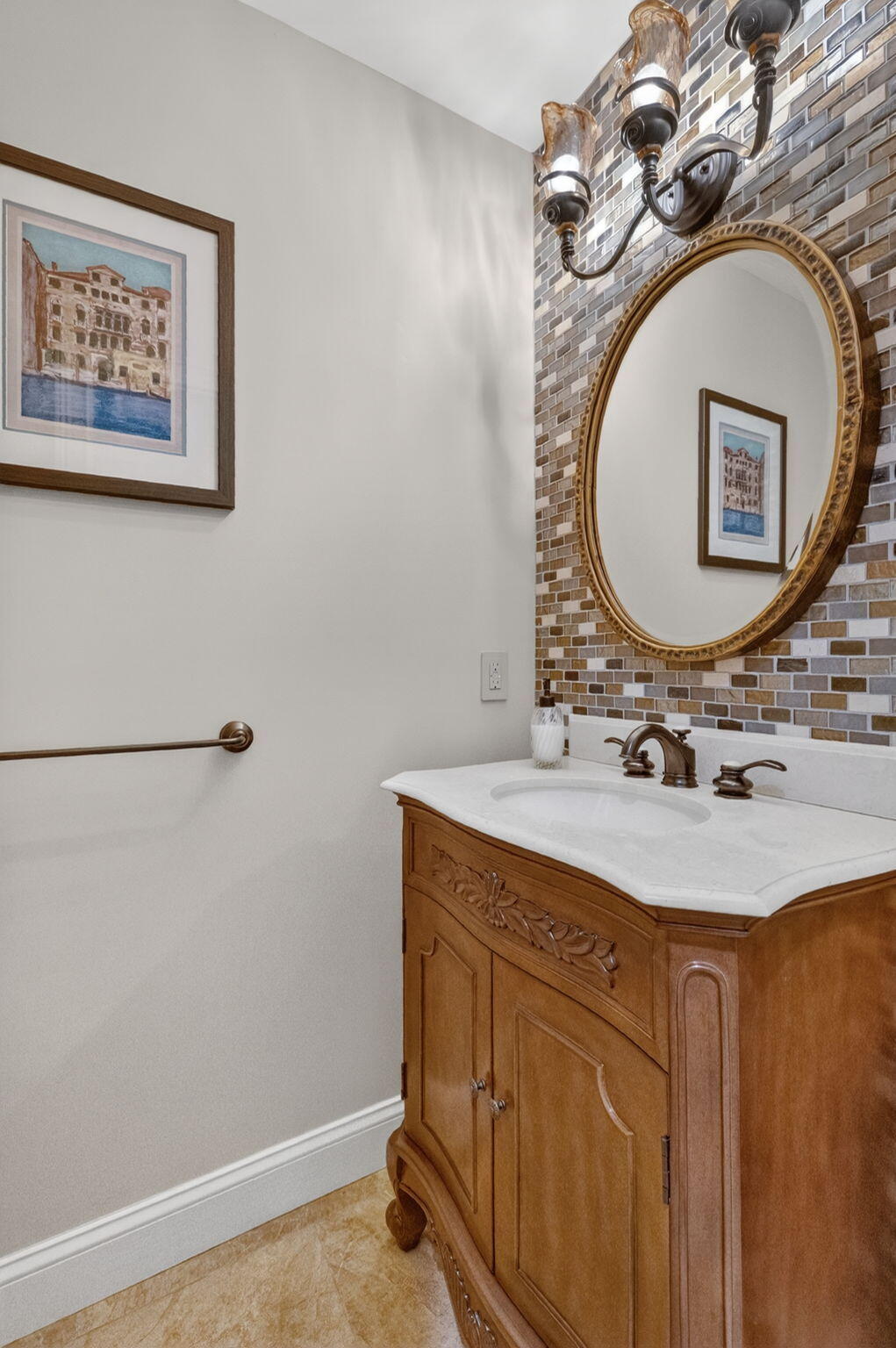 5212 Foxpointe Circle Delray Beach, FL 33445 - Photo 42 of 89 a bathroom with a sink mirror vanity and toilet