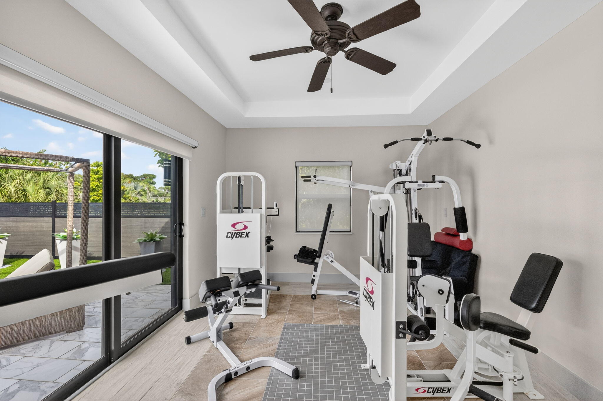 5212 Foxpointe Circle Delray Beach, FL 33445 - Photo 45 of 89 a room with gym equipment and windows