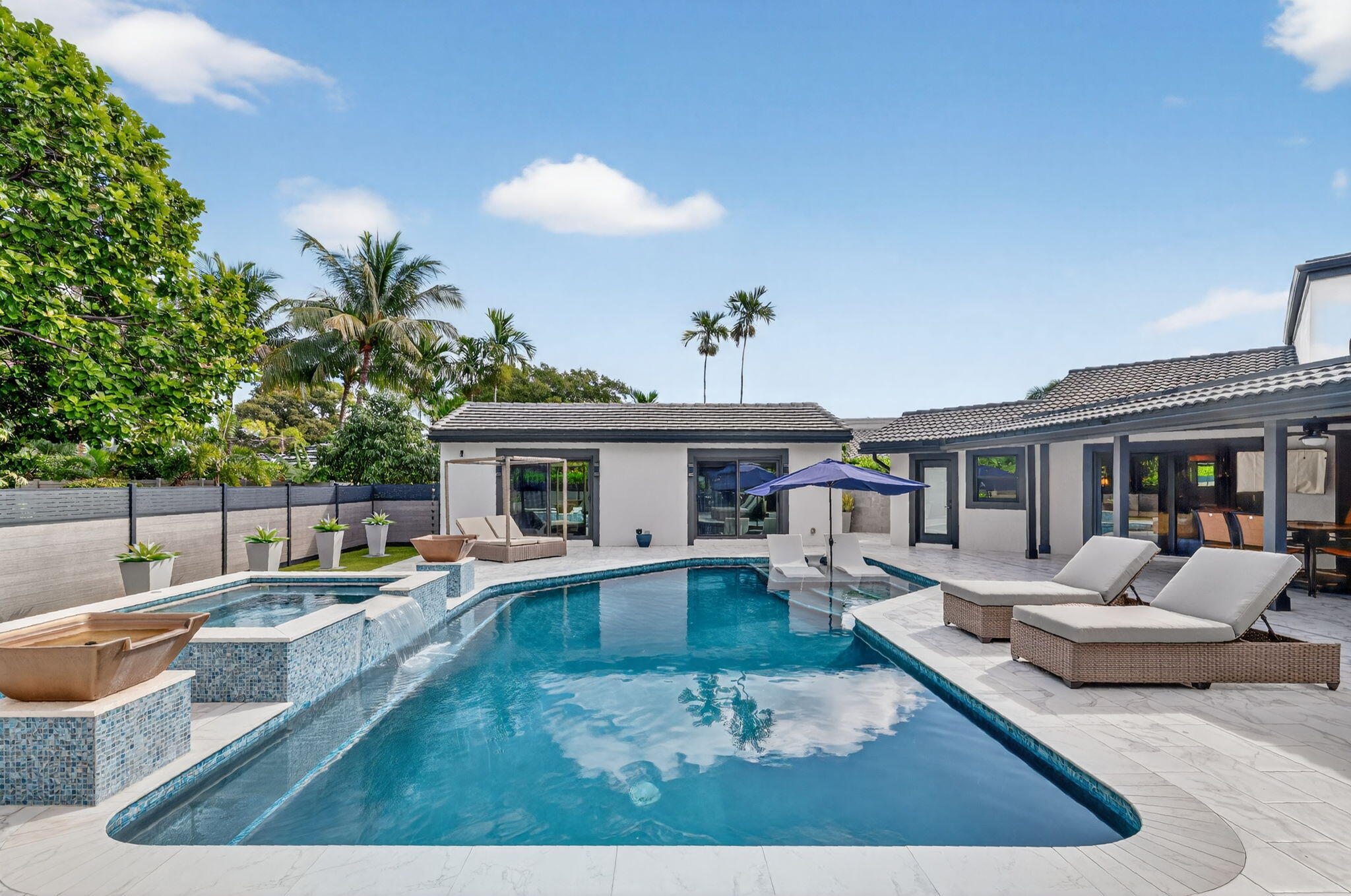 5212 Foxpointe Circle Delray Beach, FL 33445 - Photo 47 of 89 a view of a house with swimming pool and sitting area