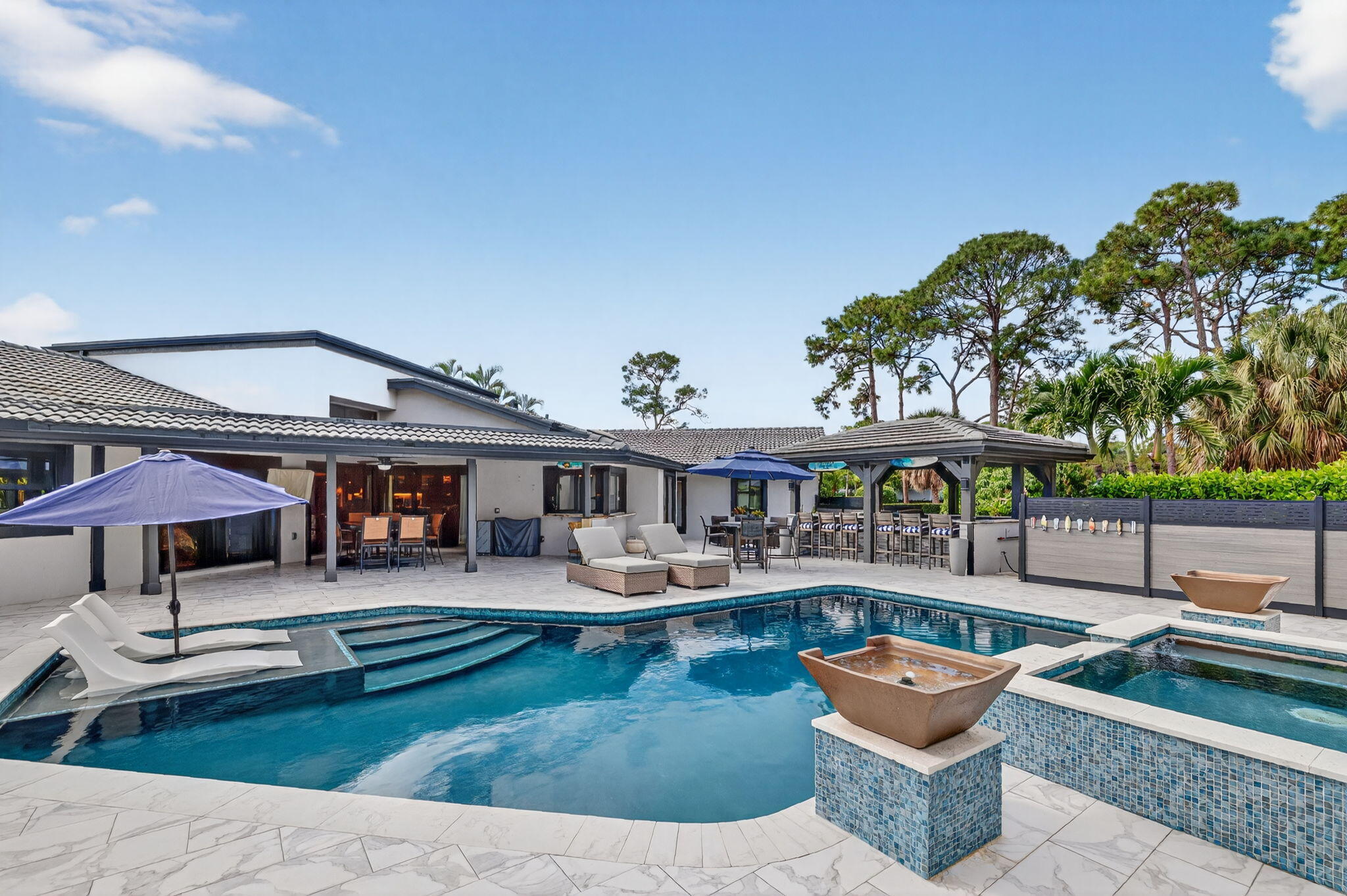 5212 Foxpointe Circle Delray Beach, FL 33445 - Photo 51 of 89 a view of a house with swimming pool and sitting area