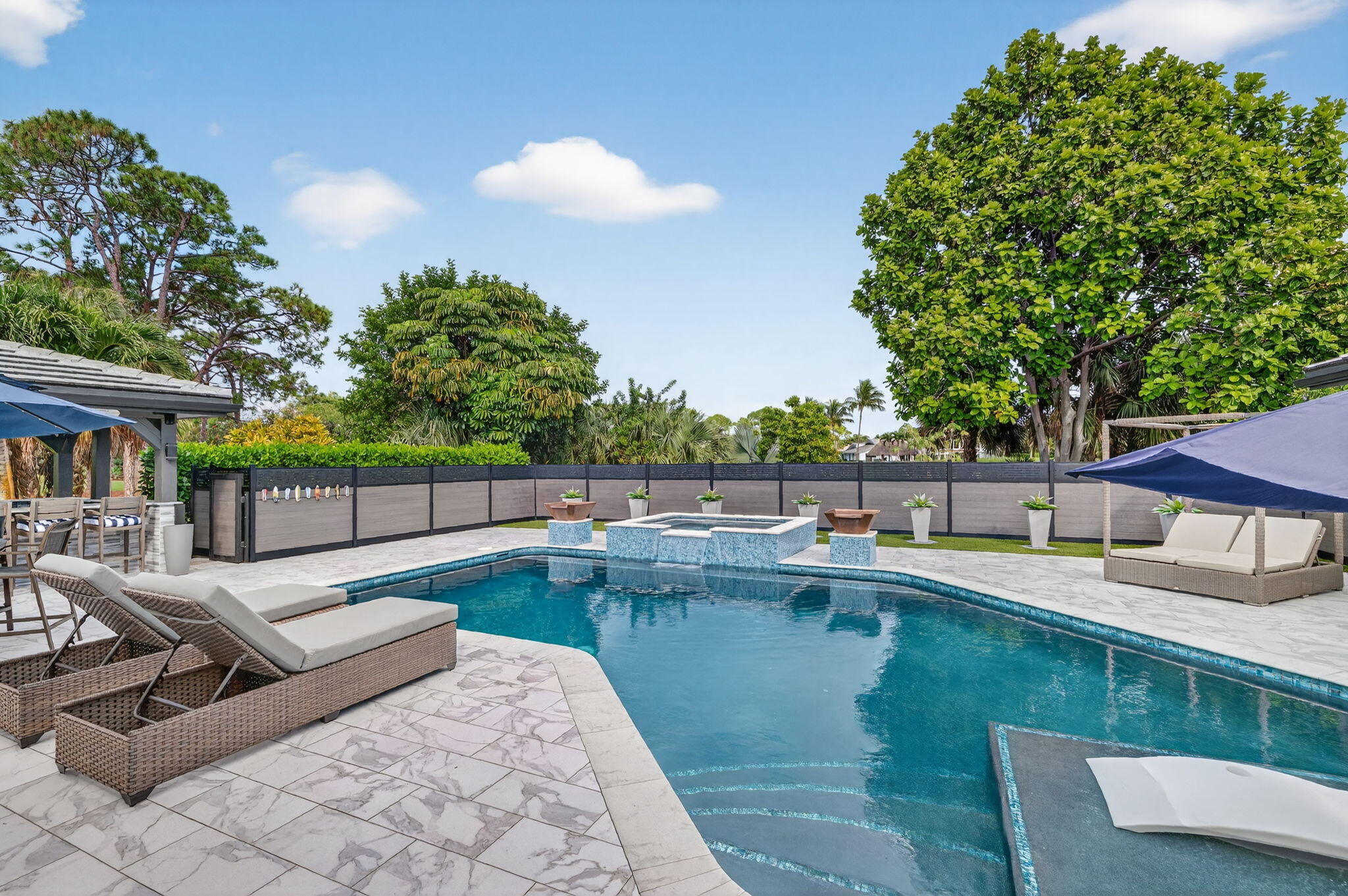 5212 Foxpointe Circle Delray Beach, FL 33445 - Photo 53 of 89 a view of a patio with chairs and a table