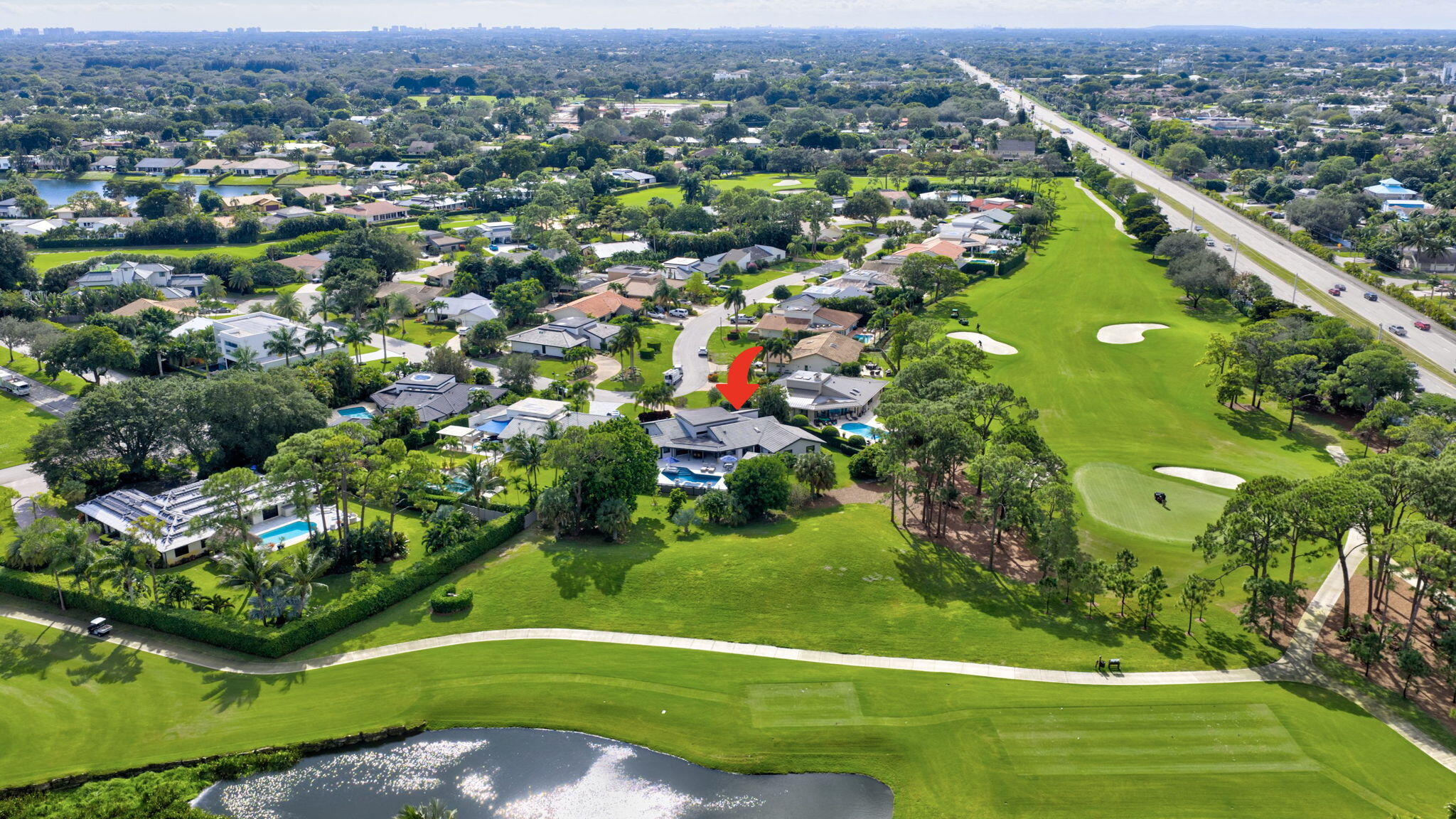 5212 Foxpointe Circle Delray Beach, FL 33445 - Photo 70 of 89 an aerial view of a houses with a yard