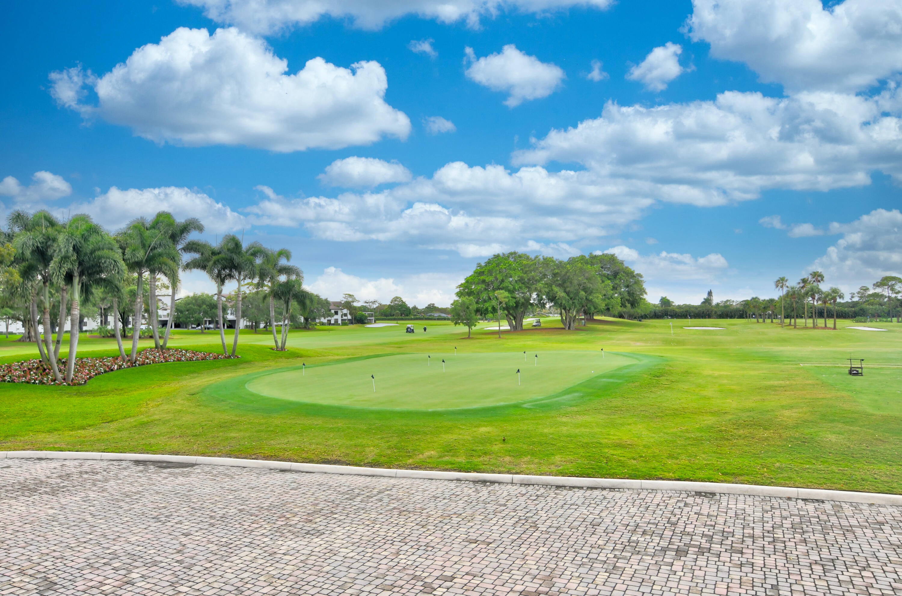 5212 Foxpointe Circle Delray Beach, FL 33445 - Photo 82 of 89 a view of a golf course with a lake