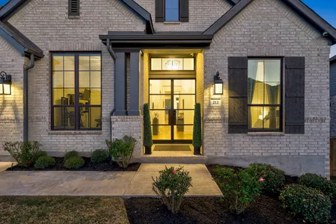 a front view of a house having yard