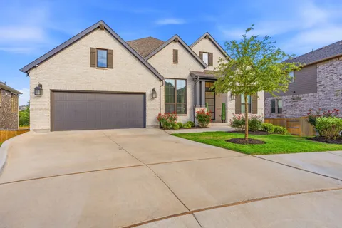 a front view of a house having yard