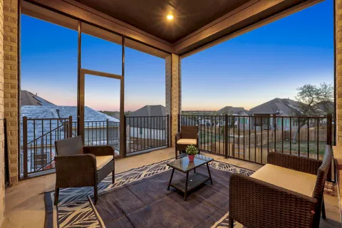 a view of a table and chairs in patio