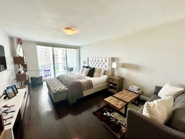 a spacious bathroom with a double vanity sink mirror and bathtub