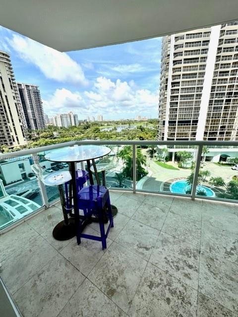 20201 East Country Club Drive, Unit 903 Aventura, FL 33180 - Photo 33 of 61 a view of swimming pool with seating space