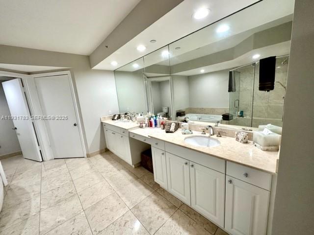 20201 East Country Club Drive, Unit 903 Aventura, FL 33180 - Photo 35 of 61 a bathroom with a sink double vanity and a mirror