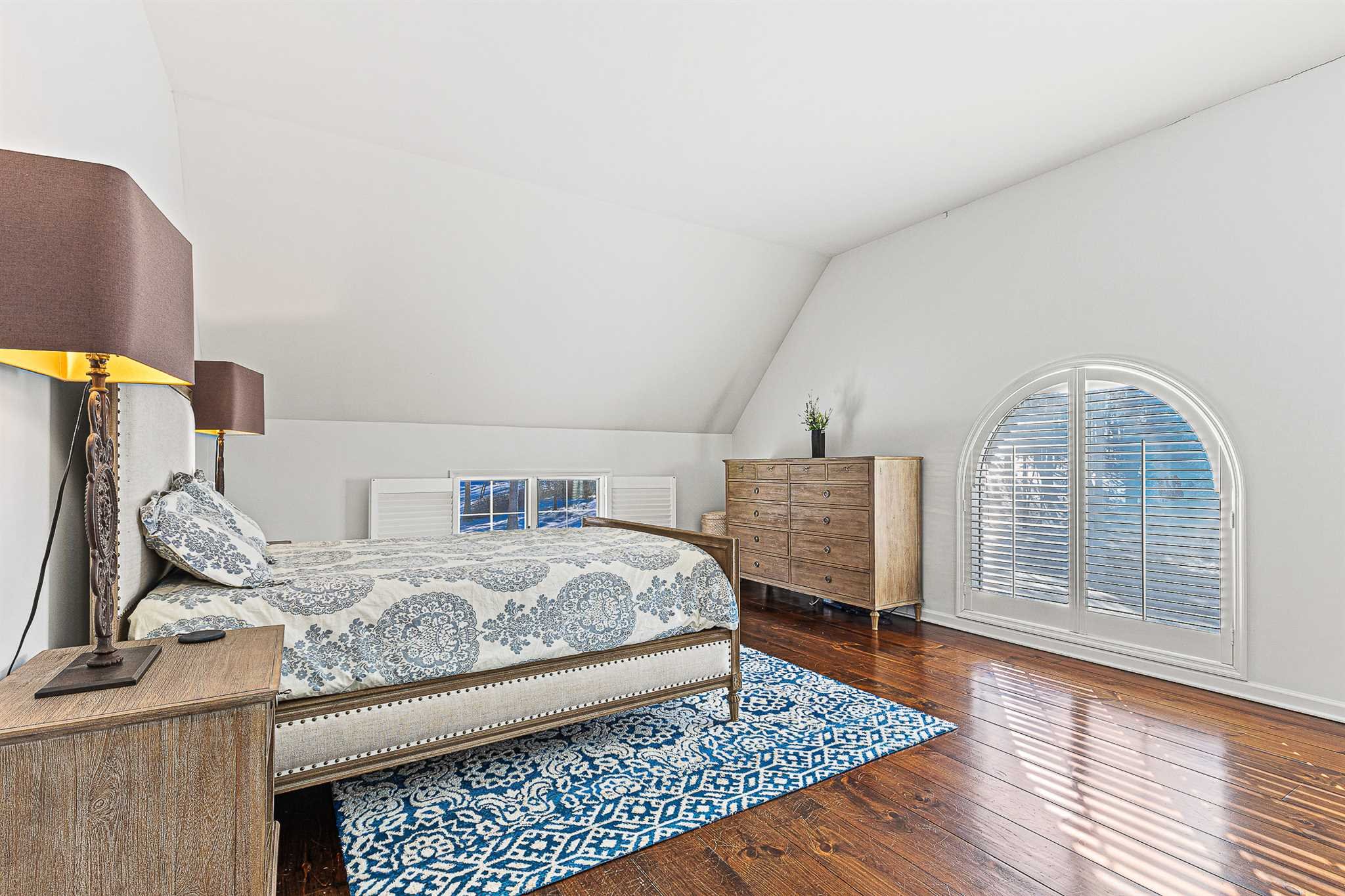 49 Linden Lane Millbrook, NY 12545 - Photo 19 of 29 a bedroom with a bed and wooden floor