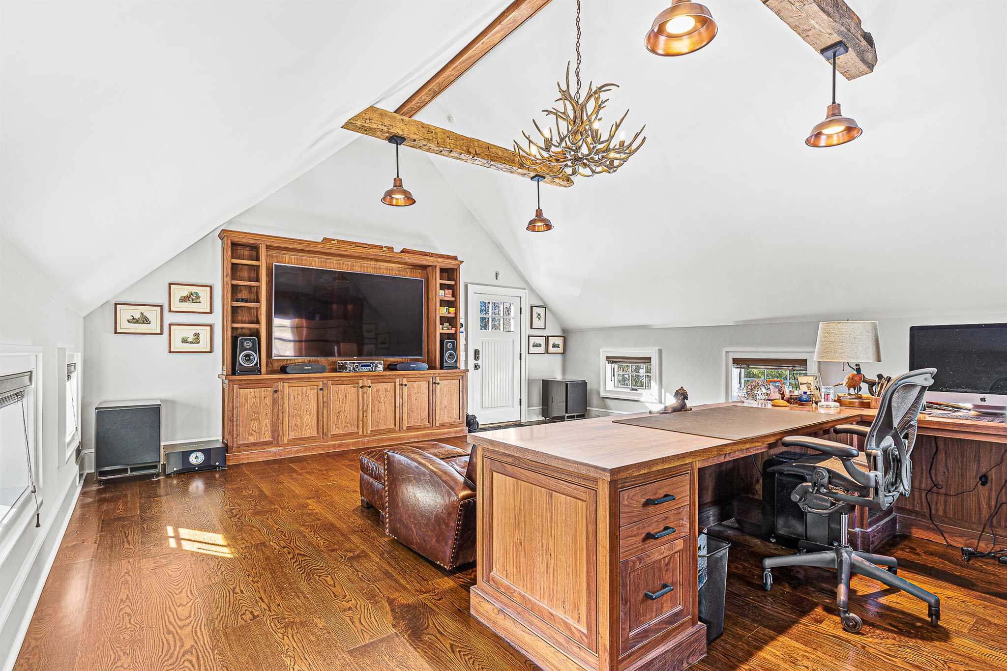 49 Linden Lane Millbrook, NY 12545 - Photo 27 of 29 a view of a livingroom with furniture and a flat screen tv