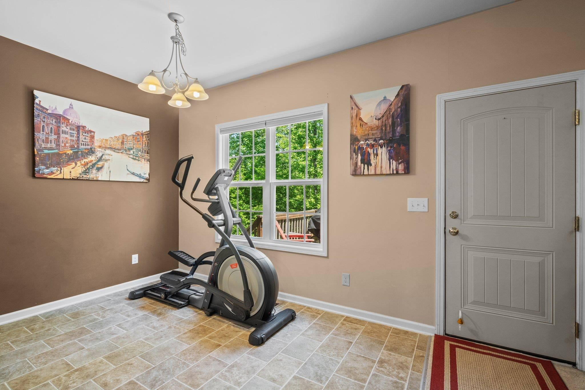 104 Griffis Drive Stem, NC 27581 - Photo 11 of 37 a view of a room with gym equipment