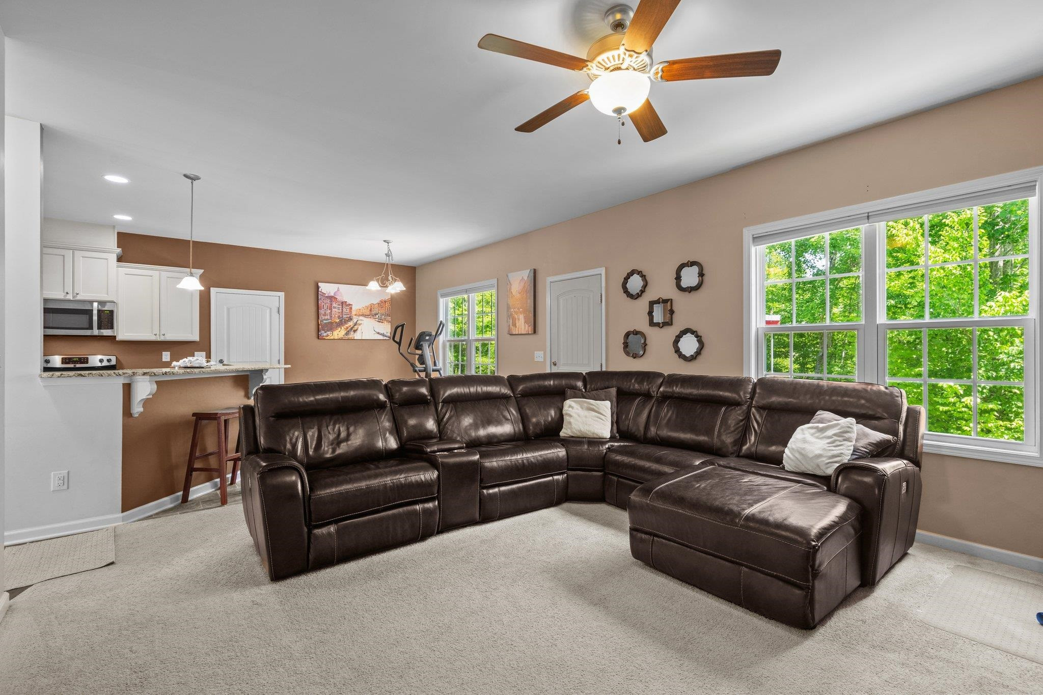 104 Griffis Drive Stem, NC 27581 - Photo 13 of 37 a living room with furniture and a large window