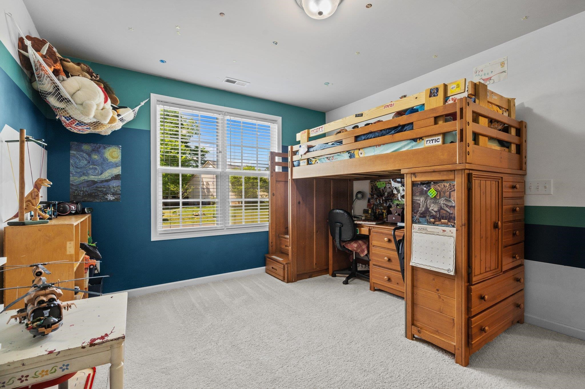 104 Griffis Drive Stem, NC 27581 - Photo 19 of 37 a bed room with a bed and a window