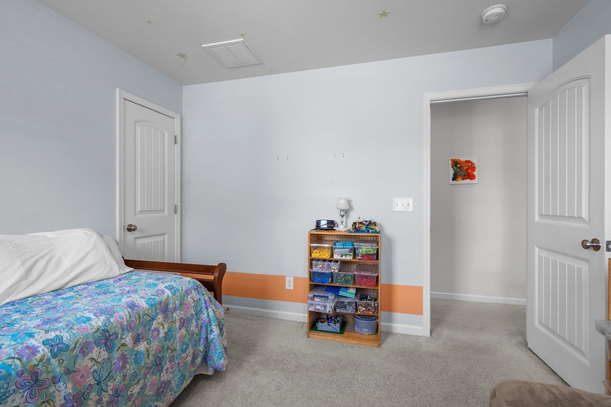 104 Griffis Drive Stem, NC 27581 - Photo 22 of 37 a bedroom with a bed and a window