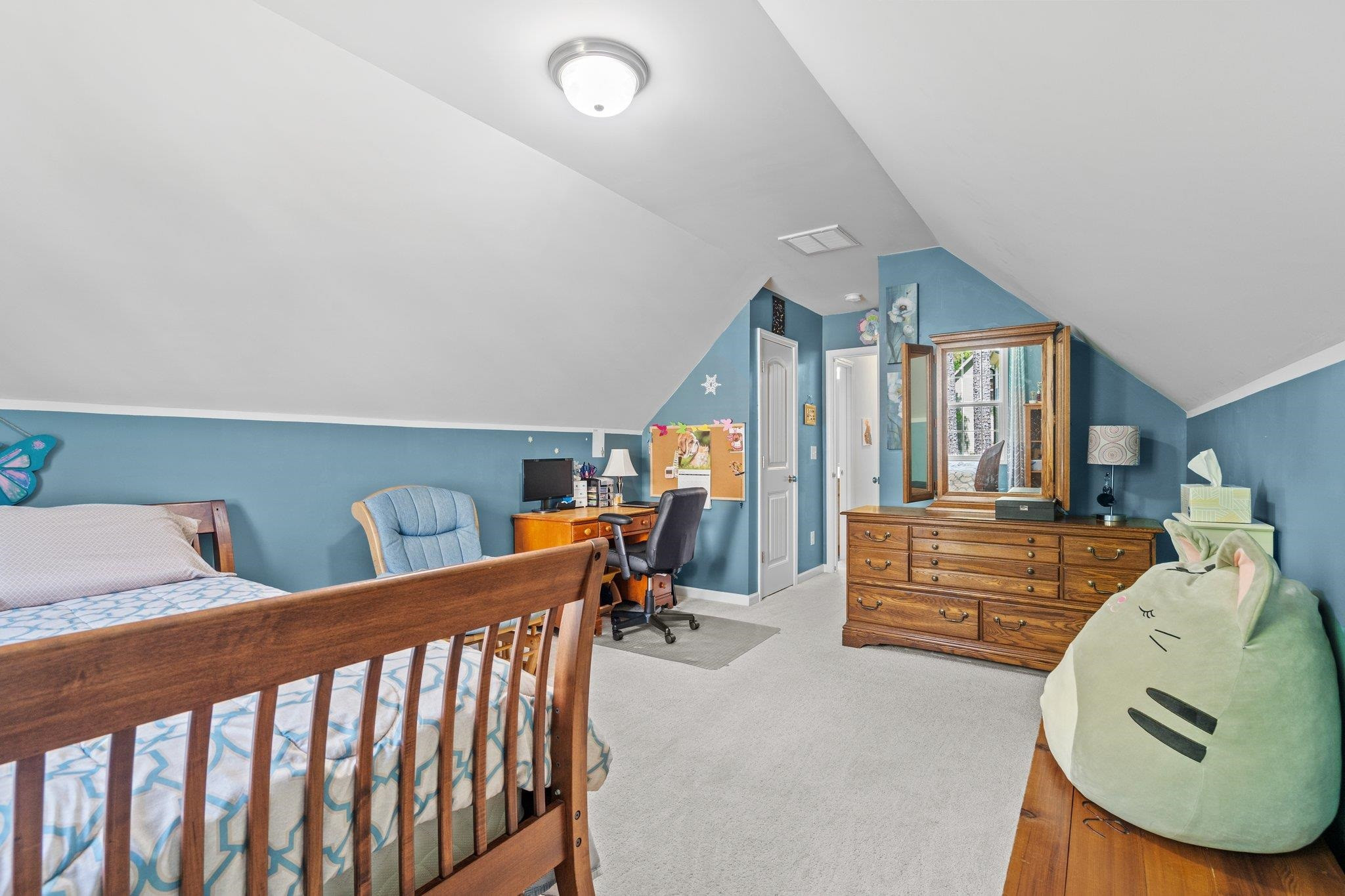 104 Griffis Drive Stem, NC 27581 - Photo 25 of 37 a bedroom with furniture and a large window