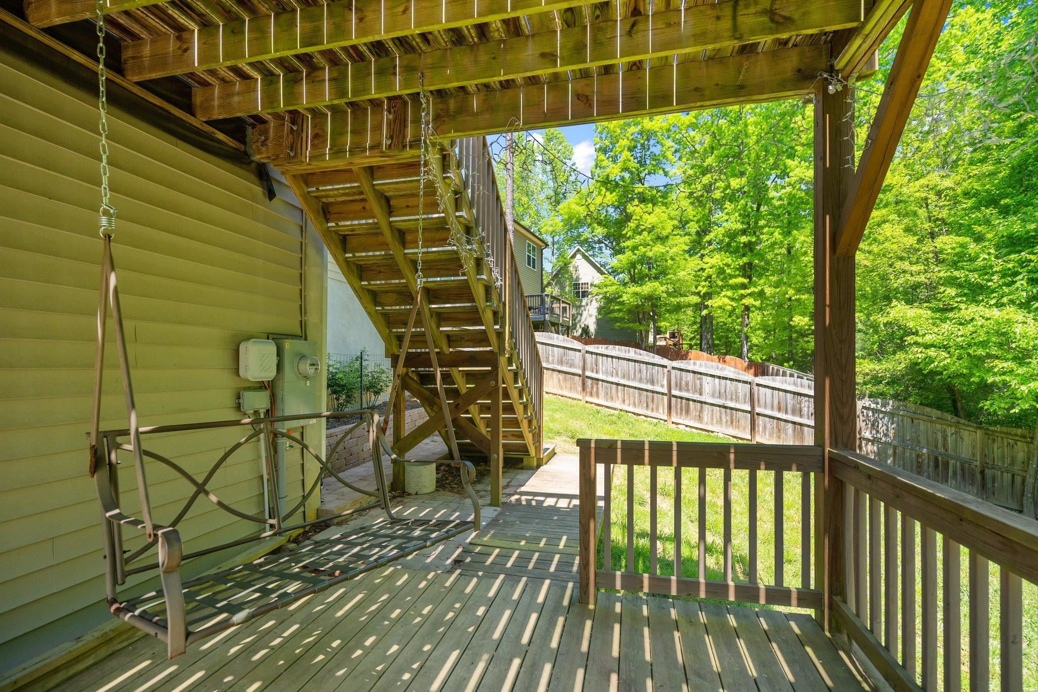 104 Griffis Drive Stem, NC 27581 - Photo 29 of 37 a view of balcony with wooden floor