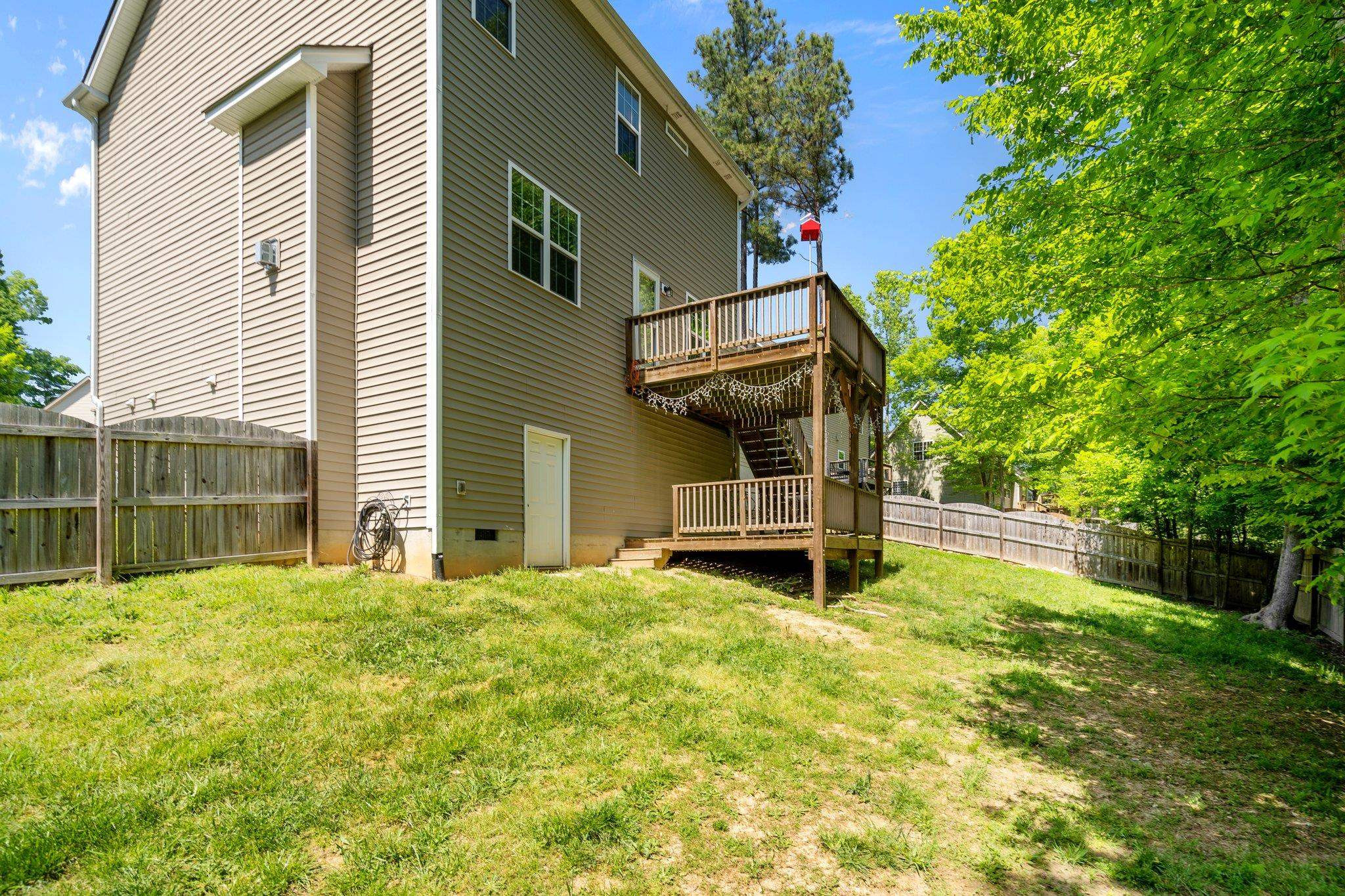 104 Griffis Drive Stem, NC 27581 - Photo 31 of 37 a backyard of a house with table and chairs