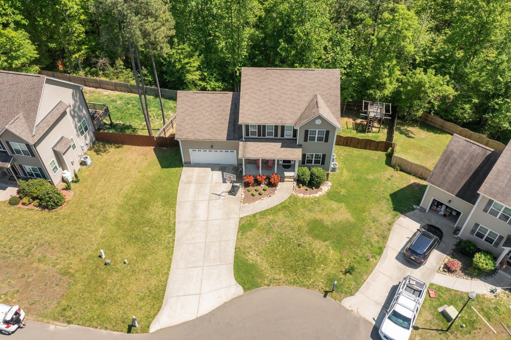 104 Griffis Drive Stem, NC 27581 - Photo 34 of 37 a view of a swimming pool with a patio