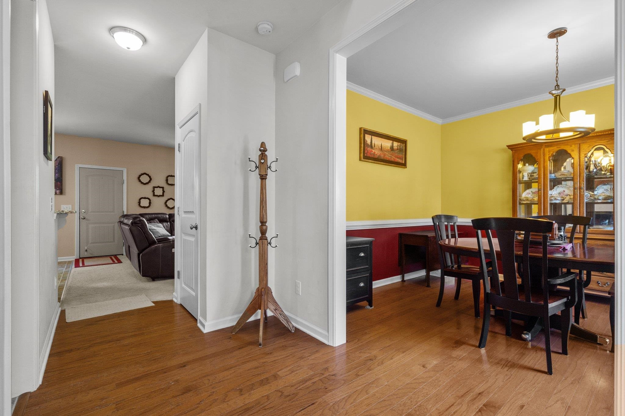 104 Griffis Drive Stem, NC 27581 - Photo 4 of 37 a view of a dining room with furniture and wooden floor