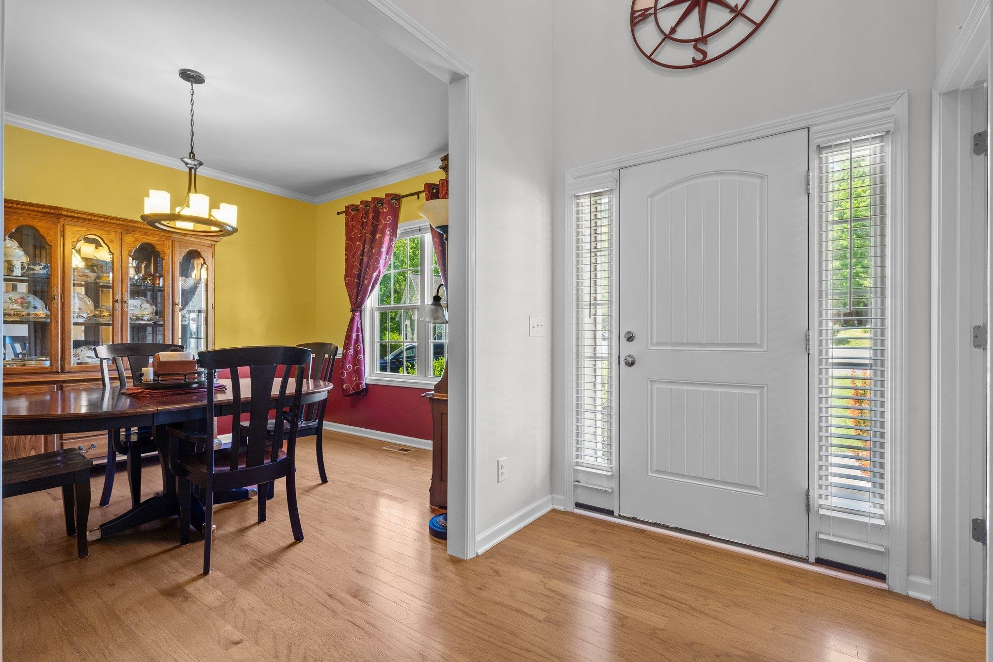 104 Griffis Drive Stem, NC 27581 - Photo 5 of 37 a view of a dining room with furniture window and wooden floor