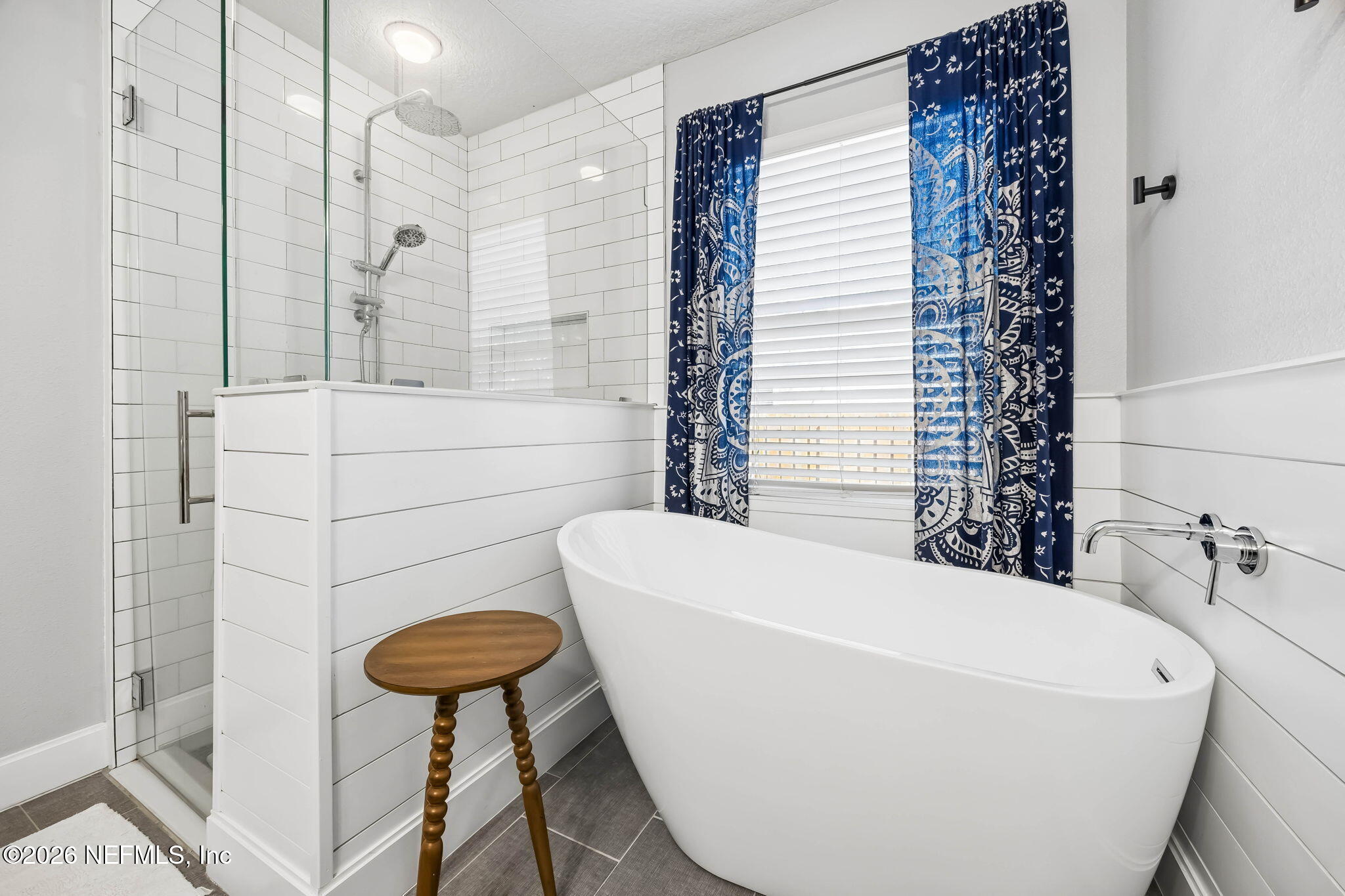 1624 Indigo Street Fernandina Beach, FL 32034 - Photo 15 of 22 a bathroom with a bathtub and shower