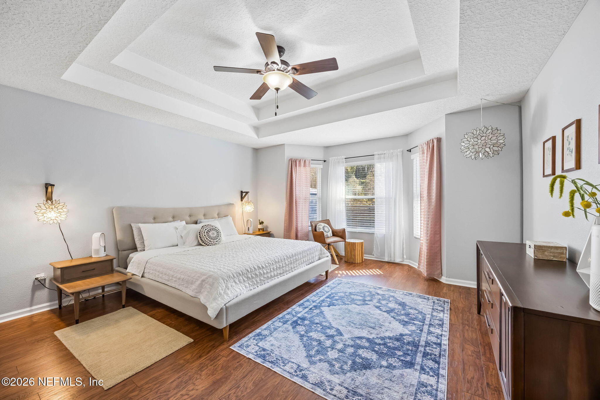 1624 Indigo Street Fernandina Beach, FL 32034 - Photo 4 of 22 a bedroom with a large bed and a desk